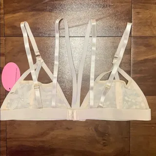 Photo of Anemone Off white sheer lace strappy caged bra triangle Large NWT