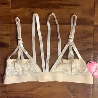 Photo of Anemone Off white sheer lace strappy caged bra triangle Large NWT