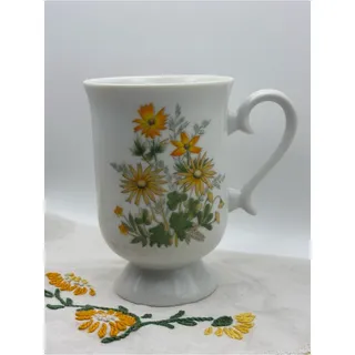 Photo of Vintage 1970s Pedestal Coffee Mug or Teacup with Yellow and Orange Floral Design