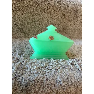 Photo of Vintage jade colored glass triangle bowl with lid and gold decorations