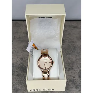 Photo of Anne Klein Women's Genuine Diamond Dial Bangle Watch- Rose Gold
