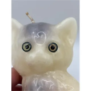 Photo of Vintage 1970s White Wax Cat Shaped Candle Figurine Featuring Yellow Eyes