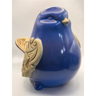 Photo of Large Ceramic Blue Bird Figurine with Intricate Scroll Work on Wings