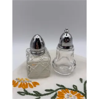Photo of Set of Mismatch Glass and Silver Salt and Pepper Shakers