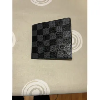 Photo of Louis Vuitton Black Checkered Bifold Wallet