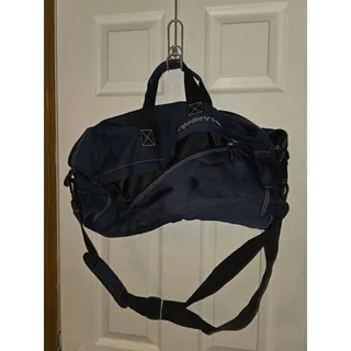 Photo of Tommy Hilfiger navy duffel bag