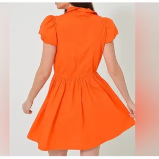 Photo of DÈLUC Women's Spread Neck Short Sleeve Plain Mini Dress in Orange SizeM