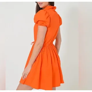 Photo of DÈLUC Women's Spread Neck Short Sleeve Plain Mini Dress in Orange SizeM