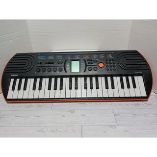 Photo of Casio SA-76 44-Key Mini Electronic Keyboard Piano W/ 100 Tones 50 Rhythms Works