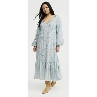 Photo of Beautiful Floral Plus Size Maxi Dress. Empire Cut With Full Sleeves / Ruffle Hem