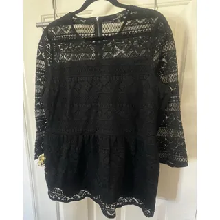 Photo of Black Laser Cut Lace Top W/Large Ruffle Hem. Great For Formal Or With Jeans.