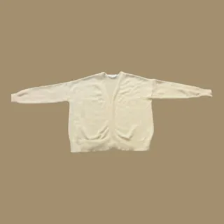 Photo of open-front, drop-shoulder cream knit cardigan sweater