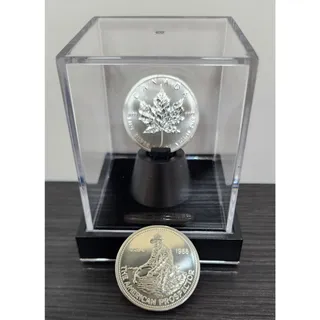 Photo of 2011 Canada Maple Leaf & 1986 Prospector .9999 Silver 1 Oz Coins  inDisplay Case