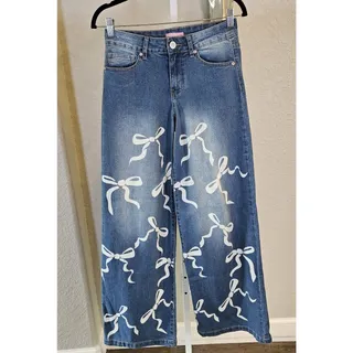 Photo of Lilac Sunset Medium Blue Wide Leg Bow Print Jeans Size 5 EUC Coquette