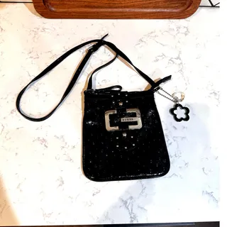 Photo of GUESS crossbody black purse silver "G" logo buckle matching flower charm VTG
