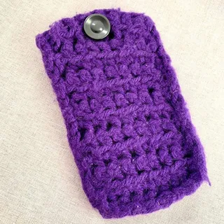 Photo of Purple Crochet Pouch Sleeve with Button