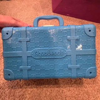 Photo of Aquabeads Delux Carry storage case with beads and accessories