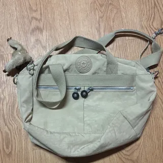Photo of Kipling Tan Shoulder Bag with Plush Keychain