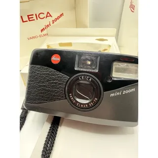 Photo of Leica Mini Zoom Vario-Elmar 35-70⁠ 35mm Film Camera Full Set Leather Case Papers