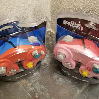 Photo of 2 Gamecube Controllers - Red & Pink (NEW) - Nintendo - Old Skool