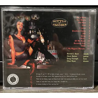 Photo of BOTTLE OF SMOKE - A WRENCH IN THE MONKEYWORKS PREOWNED OUT OF PRINT