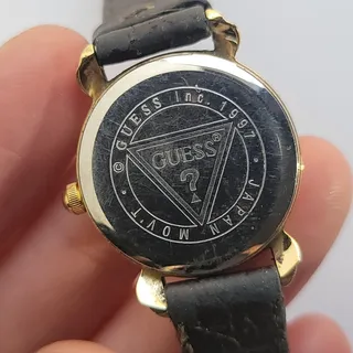 Photo of Vintage GUESS Womens Watch Gold Case White Dial Black Leather Strap Quartz