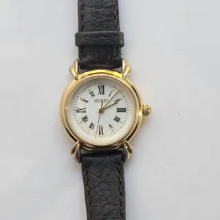 Photo of Vintage GUESS Womens Watch Gold Case White Dial Black Leather Strap Quartz