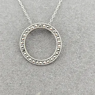 Photo of Silver Pave Circle Pendant On Silver Chain Crystal Embellished Ring Donut Simple