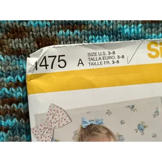 Photo of Simplicity 1475 sewing pattern girls dress top pants shorts purse dress for 18" doll 
