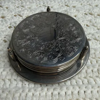 Photo of Vintage Embossed Filigree Silver Plated Coaster Set of Five + Holder Ornate Luxe