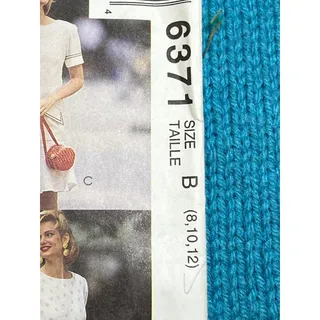 Photo of McCalls 6371 sewing pattern dress drop waist ruffle hem size 8 10 12
