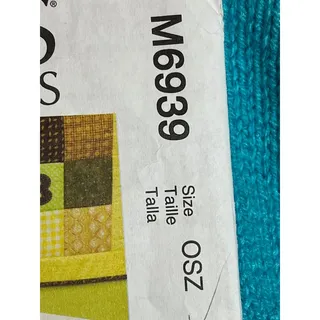Photo of McCalls 6939 Crib quilt blanket door decoration