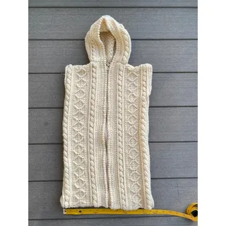 Photo of Vintage hand knit baby snuggle snack swaddle 1980's