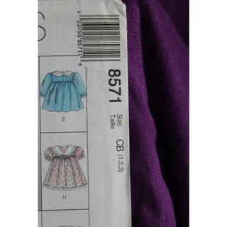 Photo of McCalls 8571 Sewing pattern girls dress puff sleeve A line skirt size 1 2 3 