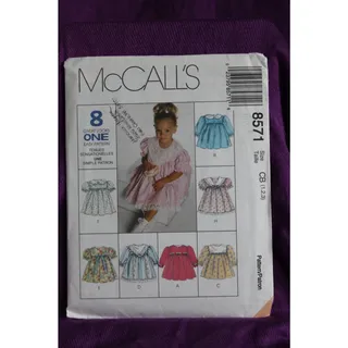 Photo of McCalls 8571 Sewing pattern girls dress puff sleeve A line skirt size 1 2 3 