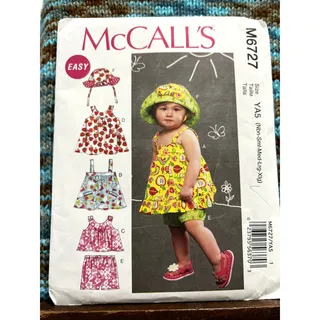 Photo of McCalls 6727 Sewing pattern infant reversible top dress shorts hat size Nb S M L XL