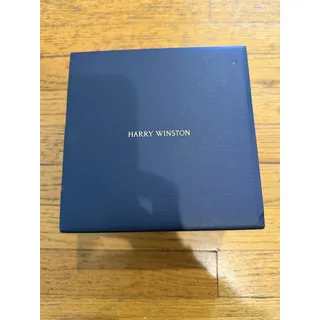 Photo of Harry Winston Scented Candle Blue Raffia Basket White Tea Mandarin Ocean Breeze