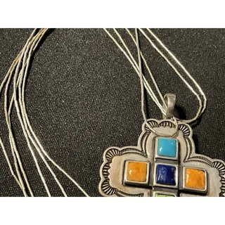 Photo of Don Lucas Cross Necklace. Liquid Silver, Turquoise, Spiny Oyster, Lapis, Coral