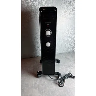 Photo of Mainstays 1500W Electric Oil-Filled Portable Radiant Space Heater + Safety Guard