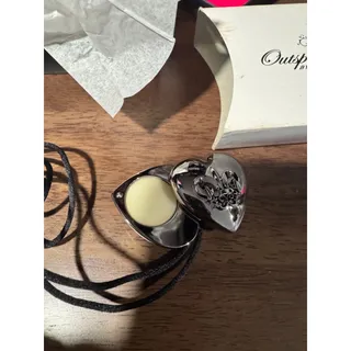 Photo of Avon outspoken by fergie perfume solid necklace Nos