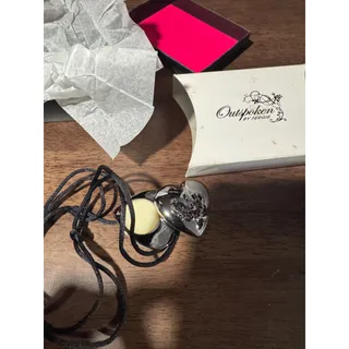 Photo of Avon outspoken by fergie perfume solid necklace Nos