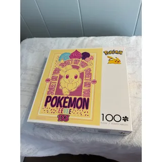 Photo of Buffalo Games 100-piece Pokemon "Sweet on You" jigsaw puzzle with eevee