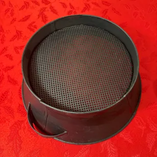 Photo of Vintage perforated metal strainer bowl 12.5 inch diameter black utility basin