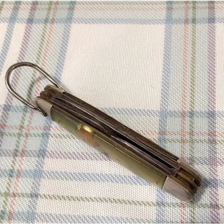 Photo of Girl SCOUT Vintage Green Pocketknife Multi-tool, Bottle Opener, Screw Driver