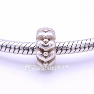 Photo of Authentic PANDORA Sterling Silver Hearts and Spots Spacer Charm