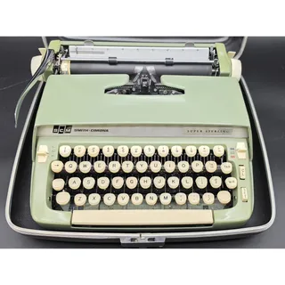 Photo of Vintage SCM Smith Corona Super Sterling Portable Manual Typewriter Case Works