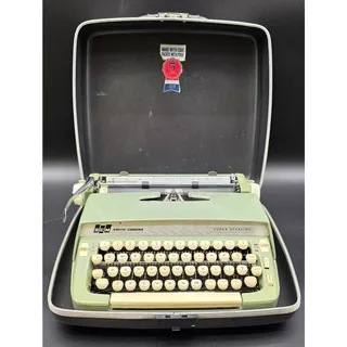 Photo of Vintage SCM Smith Corona Super Sterling Portable Manual Typewriter Case Works