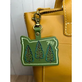Photo of Portland Leather Bag Charm Oregon Purse Charm PNW Gift Oregon Green Bag Charm