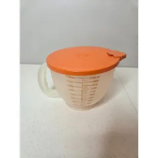 Photo of Vintage Tupperware Clear Mix-n-Store 8 Cup Measuring Bowl 500-7 with Orange Lid