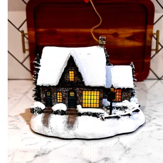 Photo of Thomas Kinkade's Village Christmas Village Clothier by Hawthorne Village 2002